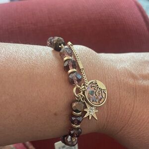 Lonna and Lilly Bracelet. Brown amber beads. God tone. Coral and star charms NWT